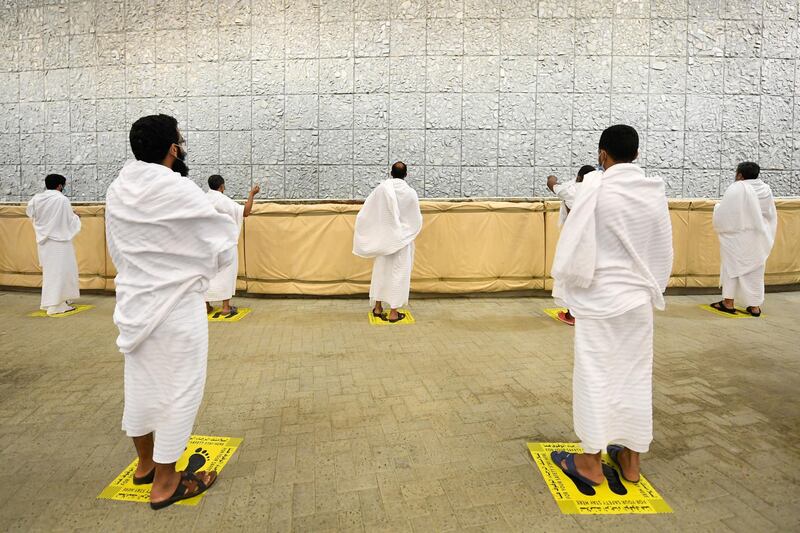 Pilgrims wait their turn to take part in the stoning of the devil ritual. Saudi Press Agency / Reuters