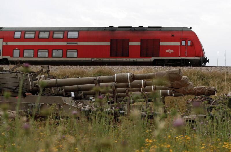 A train passes an Israeli artillery unite located next to the Israeli border with Gaza on March 29, 2019.  EPA