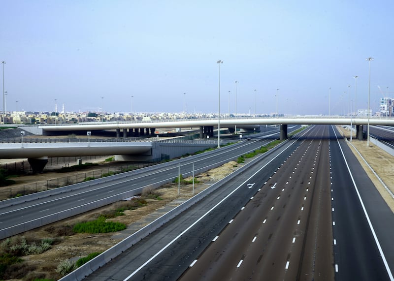 Abu Dhabi, United Arab Emirates, March 27, 2020.  The nearly empty Dubai-Abu Dhabi road on the first day of the UAE cleaning campaign.  Emiratis and residents across the UAE must stay home this weekend while a nationwide cleaning and sterilisation drive is carried out. Victor Besa / The National