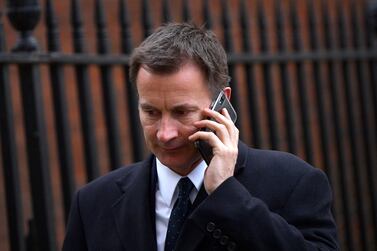 epa07464999 Foreign Secretary Jeremy Hunt leaves after a Cabinet meeting at Downing Street in London, Britain, 26 March 2019. Media reports state that British Prime Minister Theresa May was dealt another defeat as the government was lost by 27 votes on 25 March 2019, on a plan designed to find out the kind of Brexit deal British Members of Parliament would support as they voted to seize control of the parliamentary timetable. EPA/NEIL HALL