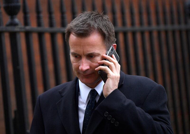 epa07464999 Foreign Secretary Jeremy Hunt leaves after a Cabinet meeting at Downing Street in London, Britain, 26 March 2019. Media reports state that British Prime Minister Theresa May was dealt another defeat as the government was lost by 27 votes on 25 March 2019, on a plan designed to find out the kind of Brexit deal British Members of Parliament would support as they voted to seize control of the parliamentary timetable.  EPA/NEIL HALL
