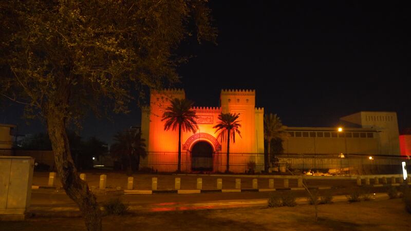 Iraq landmark lit in red.