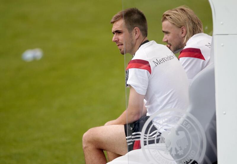 Germany's player Philipp Lahm, left, and Marcel Schmelzer watch a training match against the German U-20 team on Sunday. Ina Fassbender / Reuters