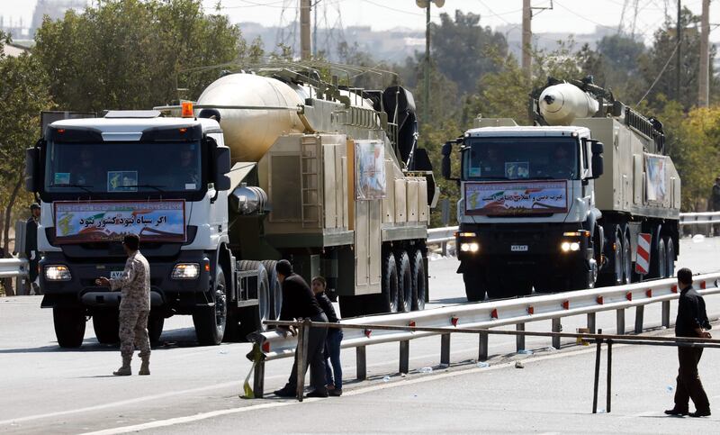 The new Iranian long range missile Khoramshahr (front) is displayed during the annual military parade marking the anniversary of the outbreak of its devastating 1980-1988 war with Saddam Hussein's Iraq, on September 22,2017 in Tehran.
Rouhani vowed that Iran would boost its ballistic missile capabilities despite criticism from the United States and also France. / AFP PHOTO / str