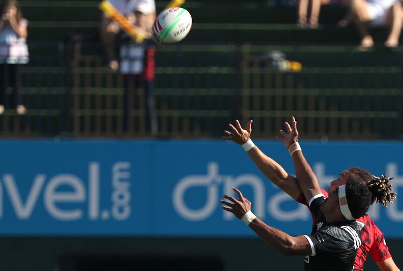 Nicole of New Zealand, left, fights for the ball with Jay Jones of Scotland during their match on November 30, 2018. AFP