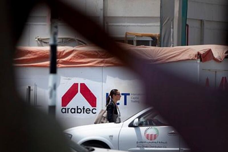 Abu Dhabi, United Arab Emirates, August 2, 2012:  
Arabtec signs are still visible as finishing work continues on Thursday, August 2, 2012, on the Nation Towers on the Corniche Road in Abu Dhabi. (Photo / Silvia Razgova)


