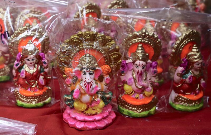 DUBAI, UNITED ARAB EMIRATES , November 1 – 2020 :- Colourful Indian idols for Diwali festival on display at the shop in Bur Dubai in Dubai. Diwali is the Indian festival of lights and this year it will be on 14th November. (Pawan Singh / The National) For News/Standalone/Online/Instagram/Big Picture 