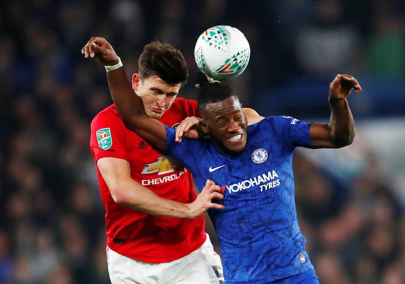 Manchester United's Harry Maguire, left, and Michy Batshuayi of Chelsea. Reuters