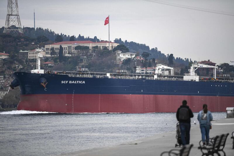 A ship sails through the Bosphorus Strait on April 23,2021 in Istanbul, on route to the Black Sea. Not content with shaping Turkey's history, President Recep Tayyip Erdogan is about to change its geography too by building an alternative to the Bosphorus -- his most outlandish "crazy" project yet. Critics accuse Erdogan of pursuing a vanity project that will open up Istanbul to unbridled construction and put the government into deep and largely unnecessary debt. / AFP / Ozan KOSE
