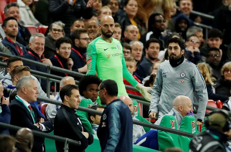 Sarri heads off towards the tunnel while sub keeper Willy Caballero is left looking on. Action Images via Reuters