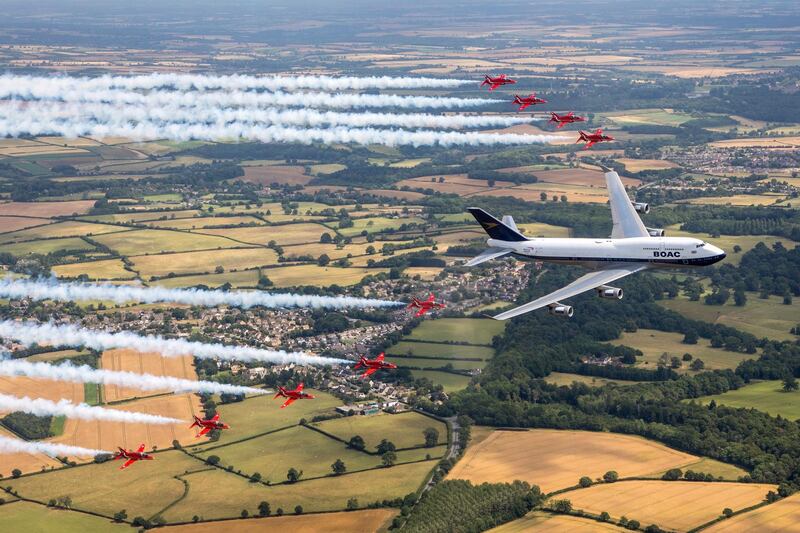 The Royal Air Force Aerobatic team, the Red Arrows, and a British Airways Boeing 747 at 2019 Royal International Air Tattoo at RAF Fairford, Britain, on July 20, 2019.  EPA / RAF