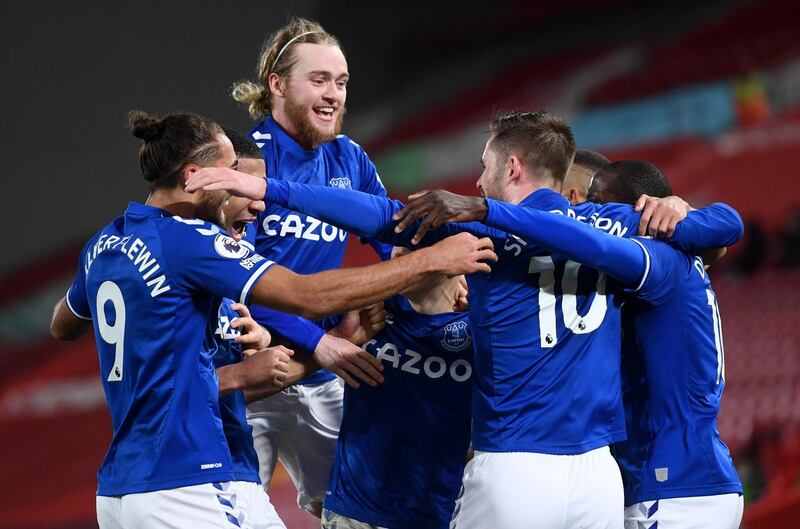 Gylfi Sigurdsson (2-R) of Everton celebrates with teammates after scoring the second goal at Anfield. EPA