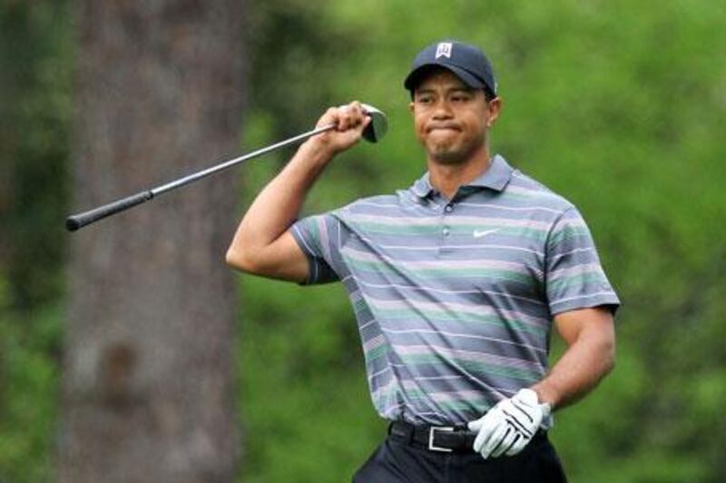 Tiger Woods reacts to a poor shot on the second hole during the first round of the 2010 Masters Tournament at Augusta National Golf Club on Thursday, April 8, 2010 in Augusta, Georgia.