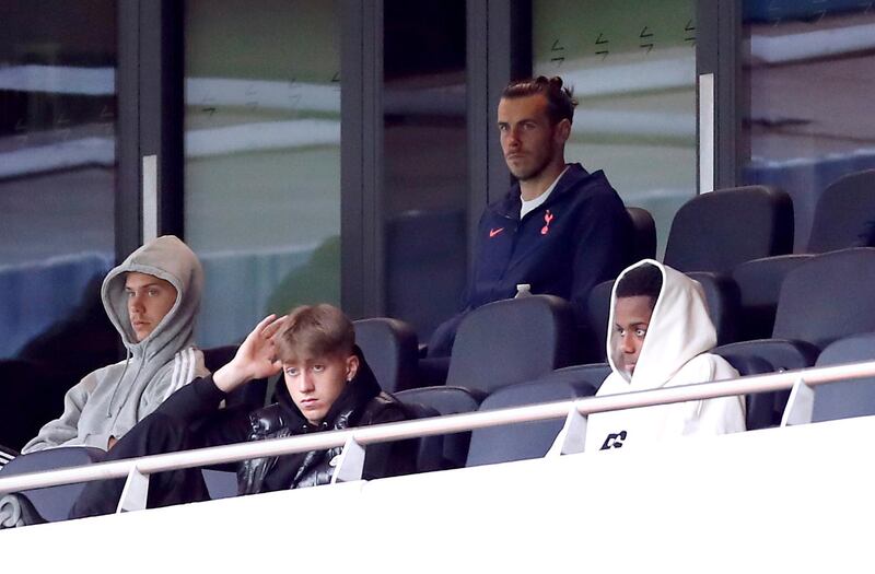 Tottenham Hotspur's Gareth Bale watches the match from the stands. PA