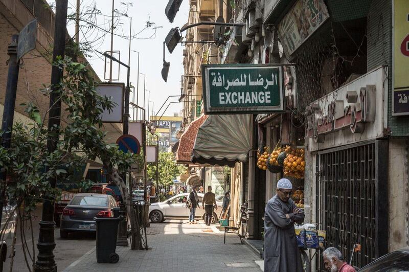 A currency exchange bureau in Cairo. The Egyptian pound could fall to as low as 17 to the dollar by the end of the year, one analyst forecasts. Photo: Bloomberg