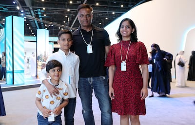 Kautilya Katariya, the world’s youngest programmer (2nd L) with his father Ishwari Prasad Katariya, mother Trupti Patidar and brother Shiv at the World Government Summit 2022 in Dubai. Pawan Singh / The National