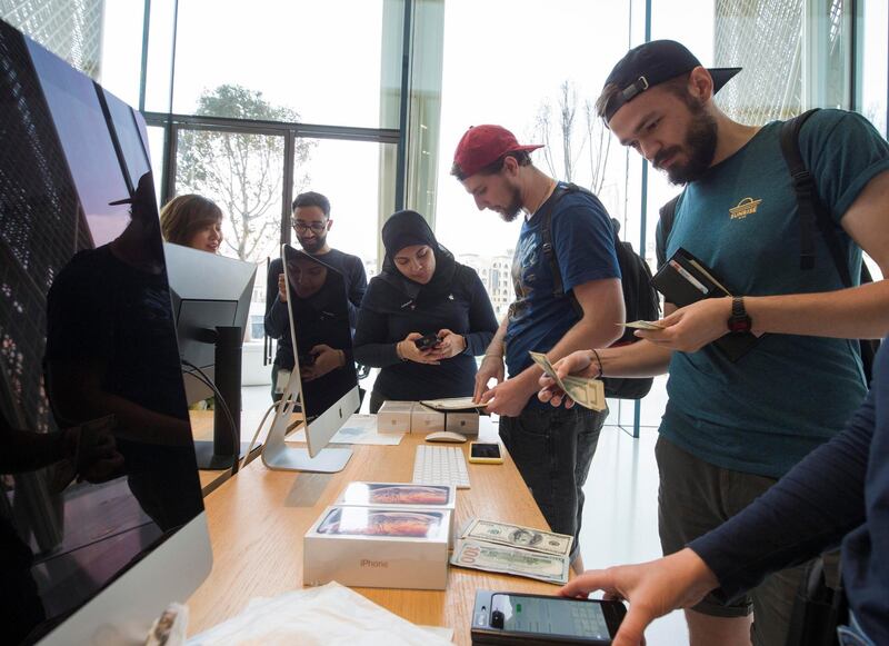 DUBAI, UNITED ARAB EMIRATES, 21 SEPTEMBETR 2018 - iPhone fans  at the launch of iPhone XS at Apple store, Dubai Mall.  Leslie Pableo for The National for Alkesh Sharma’s story