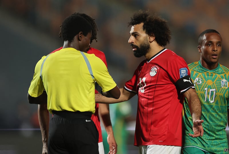 Mohamed Salah remonstrates to referee Jelly Chavani. Reuters