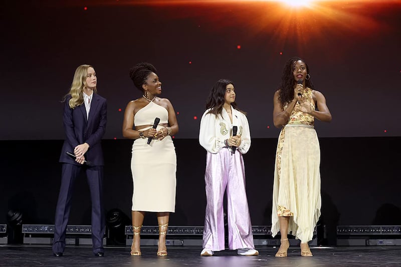 From left, Brie Larson, Teyonah Parris, Iman Vellani and Nia DaCosta at an event for The Marvels (2023). Photo: D23Expo