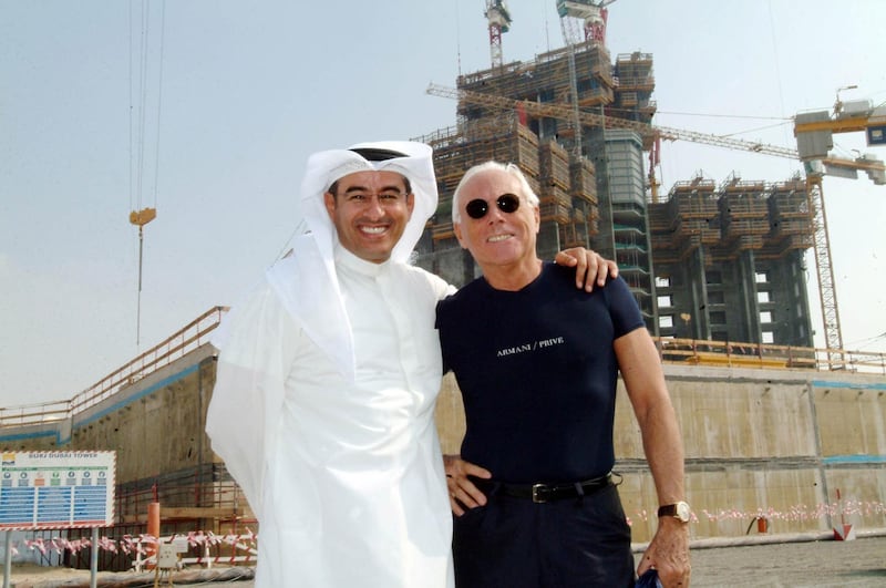 DUBAI, UNITED ARAB EMIRATES  - DECEMBER 6:  Emaar Properties' iconic Burj Dubai development received its most high profile visitor to date when celebrated Italian fashion designer Giorgio Armani was given a personal tour by Emaar's Chairman Mohamed Ali Alabbar on Sunday, December 4. The Burj Dubai, which is anticipated to be the tallest tower in the world when completed in 2008, will feature one of the world's first Armani Hotels.  (Photo by Business Wire via Getty Images)