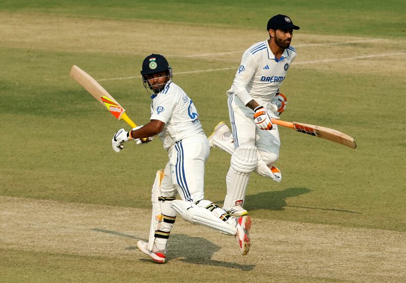 India's Sarfaraz Khan, left, hit a sizzling fifty in the company of Ravindra Jadeja, who scored a ton, on the first day of the third Test against England at the Niranjan Shah Stadium in Rajkot. Reuters