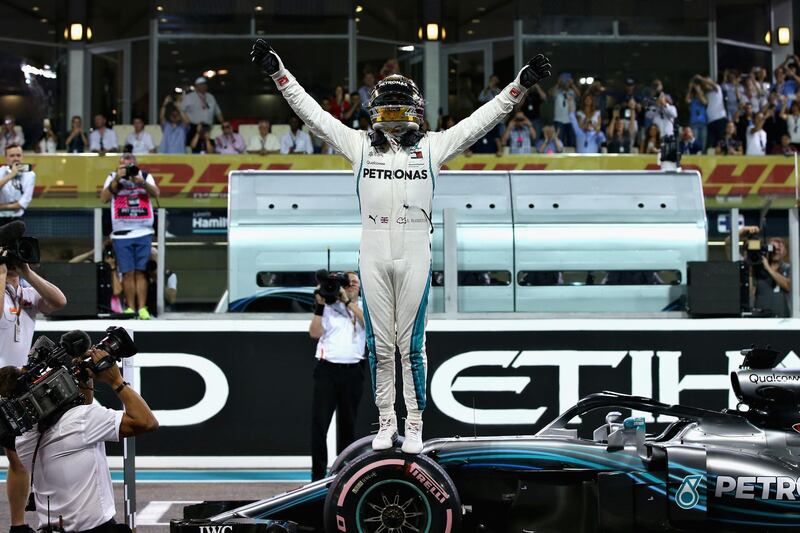 Lewis Hamilton of Great Britain and Mercedes GP celebrates in parc ferme during qualifying for the Abu Dhabi Formula One Grand Prix at Yas Marina Circuit. Getty Images