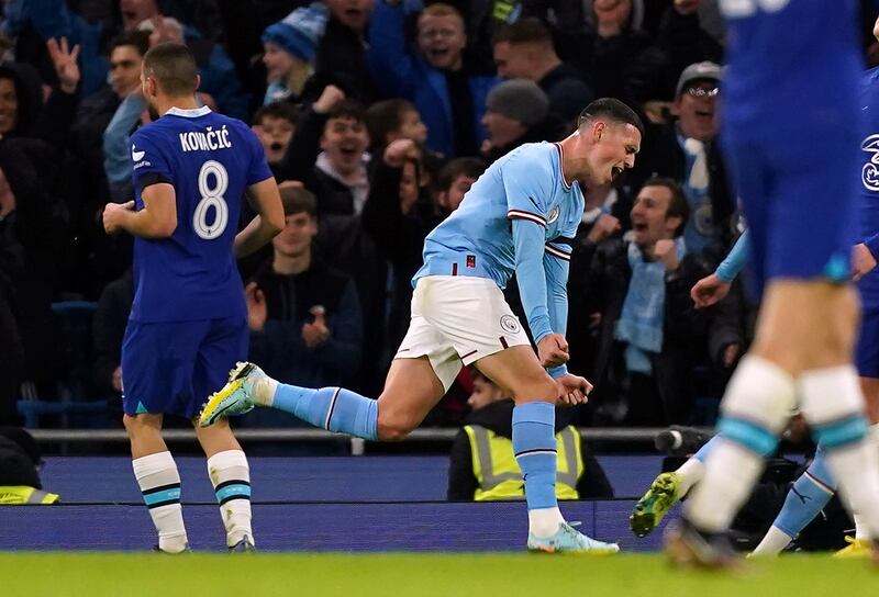 Manchester City's Phil Foden celebrates scoring the third. PA