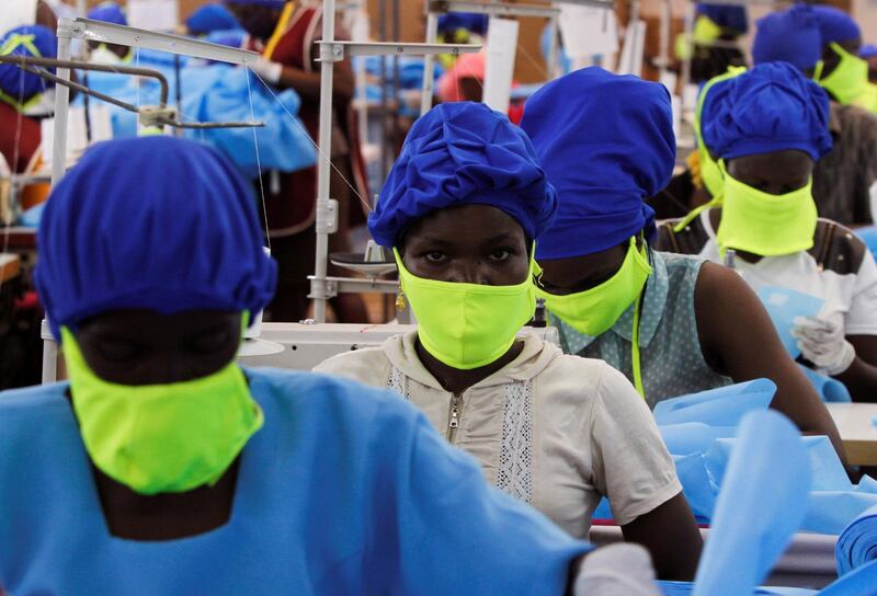 Workers are seen at a production line within the Shona Textiles Export Processing Zone  in Athi River near Nairobi, Kenya. REUTERS