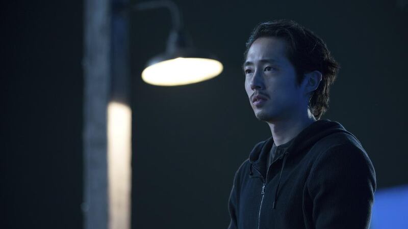 This image released by Netflix shows Steven Yeun in a scene from Okja. Jae Hyuk Lee / Netflix via AP