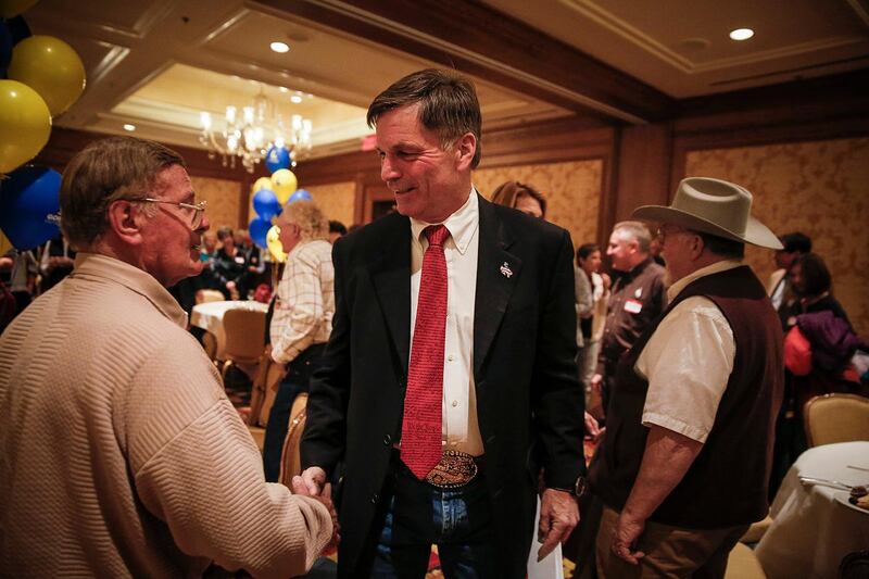 Wyoming State Treasurer Mark Gordon greets supporters in Cheyenne after he was projected to win the gubernatorial race. The Casper Star-Tribune via AP