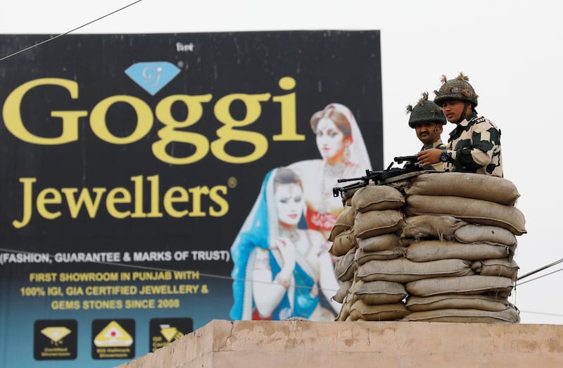 Indian Border Security Force (BSF) soldiers keep guard. Reuters