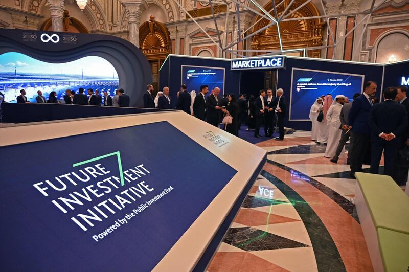 Delegates arrive at the King Abdulazziz Conference Centre in Saudi Arabia's capital Riyadh to attend the Future Investment Initiative (FII) forum on October 29, 2019. Top finance moguls and political leaders were expected at a Davos-style Saudi investment summit in stark contrast to last year when outrage over critic Jamal Khashoggi's murder sparked a mass boycott. Organisers say 300 speakers from over 30 countries, including American officials and heads of global banks and major sovereign wealth funds, are attending the three-day forum.

 / AFP / FAYEZ NURELDINE
