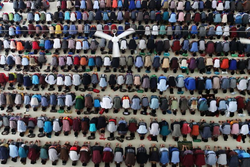 Students from Ar-Raudhatul Hasanah Pesantren offer noon prayers on the first day of fasting during the holy month of Ramadan in Medan, North Sumatra, Indonesia, on May 17, 2018. Irsan Mulyadi / Antara Foto via Reuters