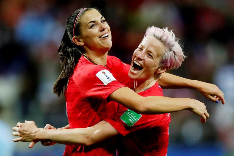 Alex Morgan, left, of the United States, celebrates scoring their 12th goal against Thailand in their 2019 Fifa Women's World Cup Group F match with captain Megan Rapinoe. Reuters