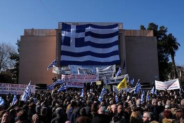 People protest outside the Municipality of Mytilene, on the northeastern Aegean island of Lesbos, Greece, to demand action from the Greek government to ease severe overcrowding at refugee camps. AP Photo/Aggelos Barai
