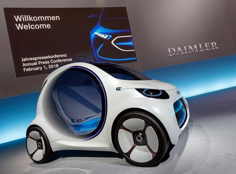 epa06489158 A concept Smart EQ electric car model is presented during the annual press conference of Daimler AG in Stuttgart, Germany, 01 February 2018. The automobile manufacturer Daimler AG reported on the 2017 financial year and gave an outlook on 2018.  EPA/RONALD WITTEK