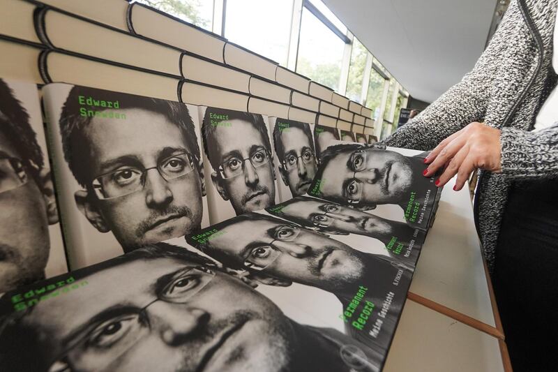17 September 2019, Berlin: Copies of Edward Snowden's new book "Permanent Record: My Story" are offered for sale during a live broadcast with Snowden at the Urania. (to dpa-KORR "Permanent Record": Edward Snowden writes down his life) Photo: JÃ¶rg Carstensen/dpa (Photo by JÃ¶rg Carstensen/picture alliance via Getty Images)