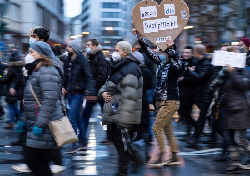 Protesters demonstrate against Covid-19 measures and compulsory vaccination in Frankfurt, Germany. AP