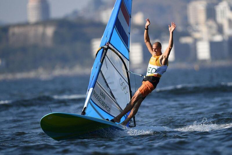 Netherlands’ Dorian Van Rijsselberge celebrates after winning the RS:X men’s sailing final race on Guanabara Bay in Rio de Janerio during the Rio 2016 Olympic Games on August 14, 2016. William West / AFP