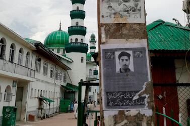A poster of Kashmiri youth Usiab Ahmad, who drowned on August 5, allegedly after an encounter with Indian government forces near the Asar Shareef Jenab Saheb Mosque in Srinagar. Three deaths have been claimed by Kashmiri familes in the latest round of unrest in the region, but Indian authorities have not acknowledged any fatalities. AFP