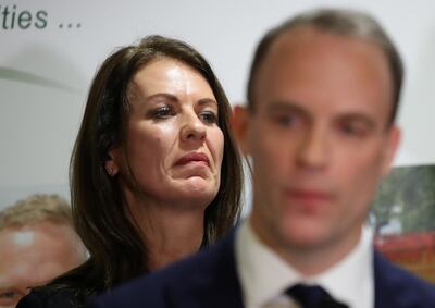 Liberal Democrats candidate Monica Harding looks on as Conservative Party candidate Dominic Raab (R) speaks after he was announced as the winner for the constituency of Esher and Walton at a counting centre for Britain's general election in Esher, Britain December 13, 2019.  REUTERS/Chris Radburn