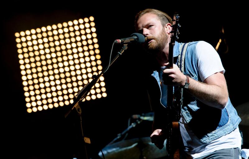 Caleb Followill from U.S band Kings of Leon performs at the V Festival in Chelmsford, England, Sunday, Aug. 18, 2013. (Photo by Jonathan Short/Invision/AP) *** Local Caption ***  Britain V Festival 2013 Chelmsford Day 2.JPEG-0649f.jpg