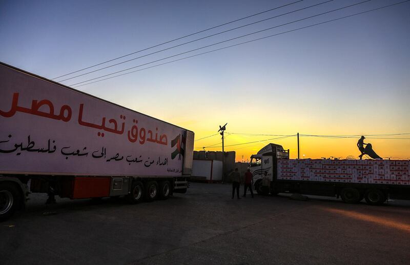 Lorries carrying Egyptian aid at Rafah border crossing between Egypt and the Gaza Strip. EPA