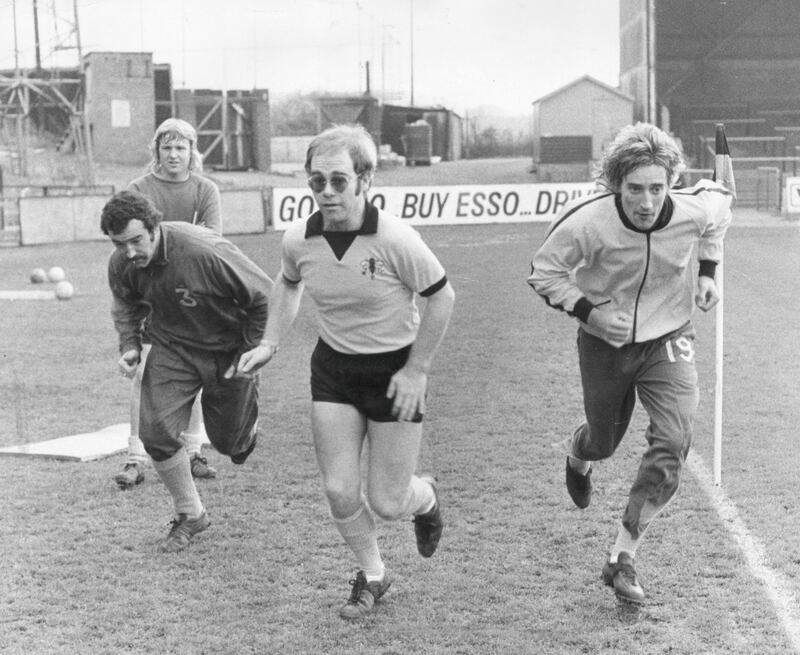 7th November 1973:  British singer-songwriter and vice-president of Watford FC Elton John and Rod Stewart wearing Watford strip at Vicarage Road.  (Photo by Sydney O'Meara/Evening Standard/Getty Images)