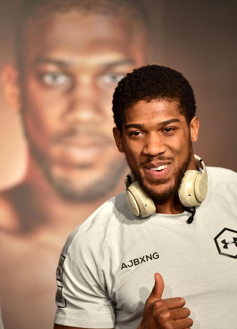 British heavyweight boxing challenger Anthony Joshua is pictured during a press conference in Ad Diriyah, a Unesco-listed heritage site, outside Riyadh, on December 4, 2019, ahead of the upcoming "Clash on the Dunes". - The hotly-anticipated rematch between Ruiz Jr and British challenger Anthony Joshua is scheduled to take place in Diriya, near the Saudi capital on December 7. (Photo by FAYEZ NURELDINE / AFP)