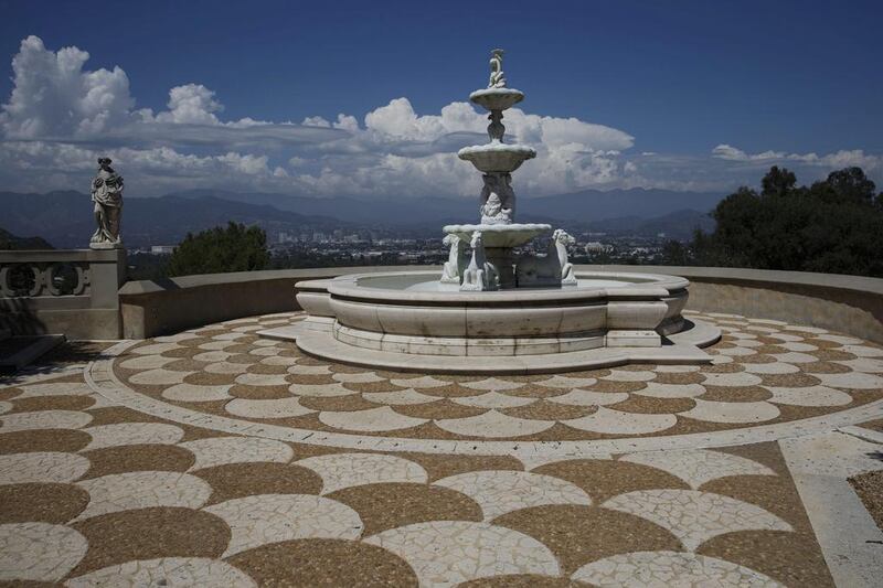 A fountain stands overlooking the valley. Patrick T. Fallon / Bloomberg