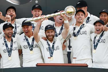 Cricket - ICC World Test Championship Final - India v New Zealand - Rose Bowl, Southampton, Britain - June 23, 2021 New Zealand's Kane Williamson celebrates with the trophy and teammates after winning the final to because the ICC World Test Champions