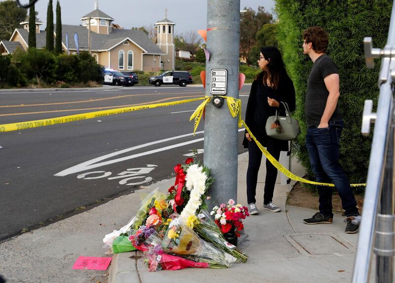 A makeshift memorial is placed by a light pole a block away from the shooting at the Congregation Chabad synagogue in Poway, San Diego, California, April 27, 2019. Reuters