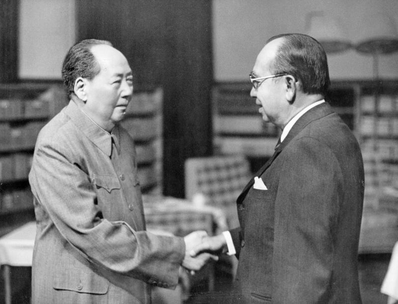 (Original Caption) Chairman Mao Tsetung Meets Malaysian prime minister Razak. Chairman Mao Tsetung met and had a friendly and frank talk on May 29 afternoon with Malaysian Prime Minister Tun Abdul Razak Bin Datuk Hussein. Present on the occasion were Premier Chou En-lai, Vice-Chairman Wang Hung-wen, Vice-Premier Li Hsien-nien, Assistant Foreign Minister Wang Hai-jung, and Tang Wen-sheng, and Chang Han-chih. Chairman Mao shaking hands with Prime Minister Razak. Getty Images
