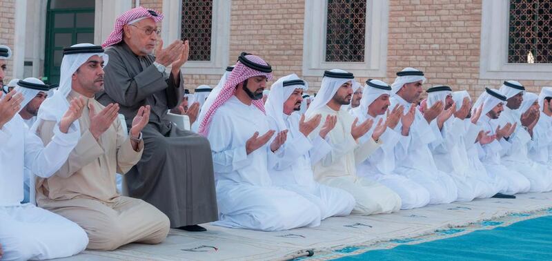 Sheikh Humaid bin Rashid Al Nuaimi, Ruler of Ajman, and Sheikh Ammar bin Humaid Al Nuaimi, Crown Prince of Ajman, perform prayers for rain at Sheikh Rashid bin Humaid Al Nuaimi Mosque. Wam